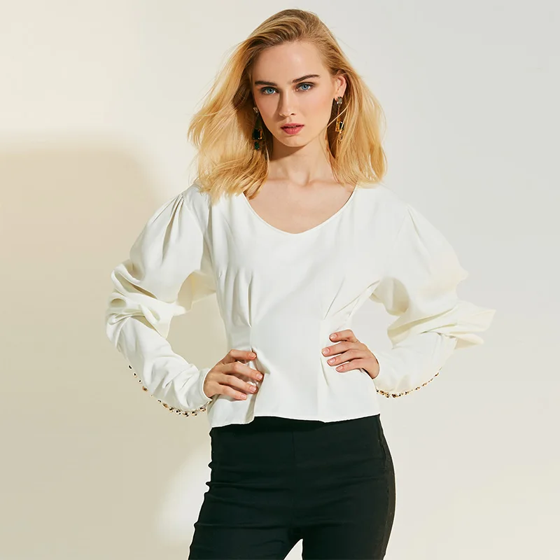 Girls white blouse long sleeves and covers neck