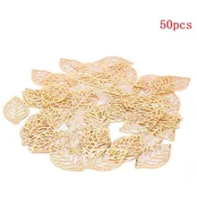 Novo 50 pçs diy ouro charme jóias fazendo chapeado para pente de cabelo artesanato oco folhas pingente retro jóias acessórios