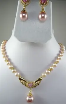 

Prett Lovely Women's Wedding shipping>>>>>Fashion White/Pink Pearl Necklace &Shell/gem Pendant Earring Set newjewelry