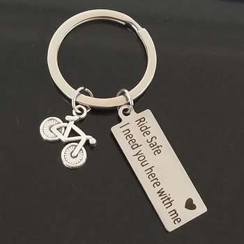 

Laser engraving keychain ride safe heart i need you here with me bicycle pendant key ring lettering key chain couple gift
