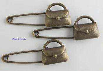 

Amazzing styles!!! 50mm bronze bag shape brooches 2017 RT#1630