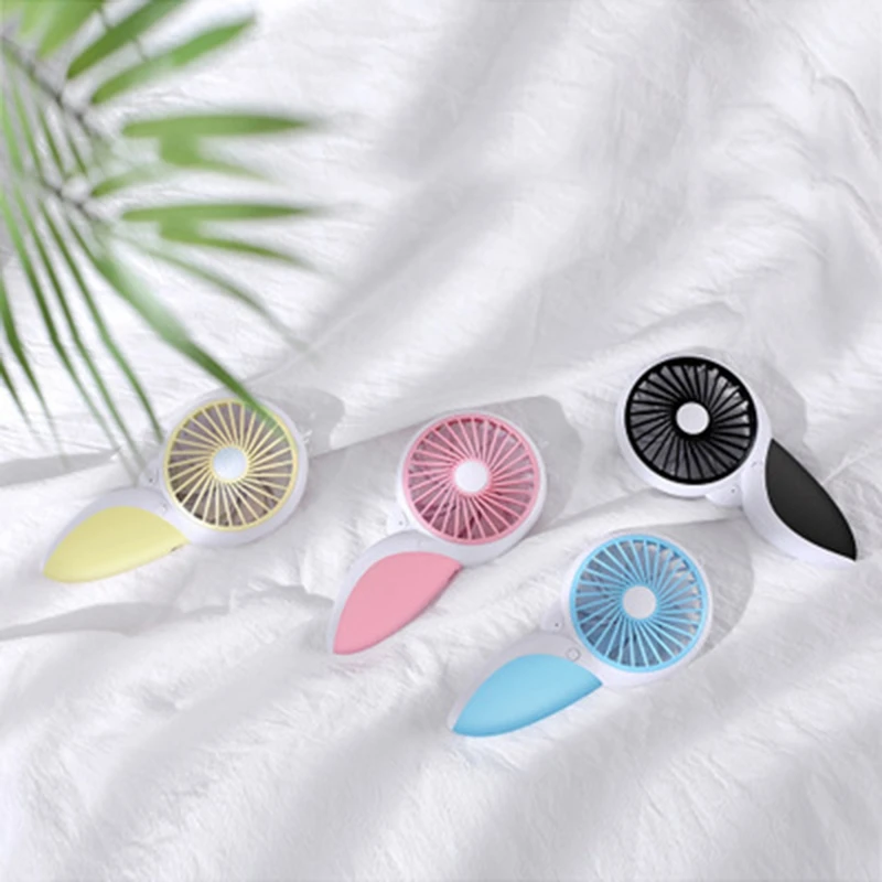 

Handheld Electric Mini Portable Outdoor Fan Foldable Handle Desktop Cartoon Usb Rechargeable Fan With Led Light Cooling Fan