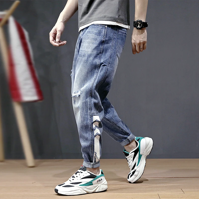 

Fashion Streetwear Men Jeans Blue Color Loose Fit Harem Pants Taper Trousers Printed Designer Small Leg Hip Hop Ripped Jeans Men