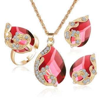 

Best selling three-piece gold plated crystal water drops peacock three-piece kit pendant necklace earrings ring set women