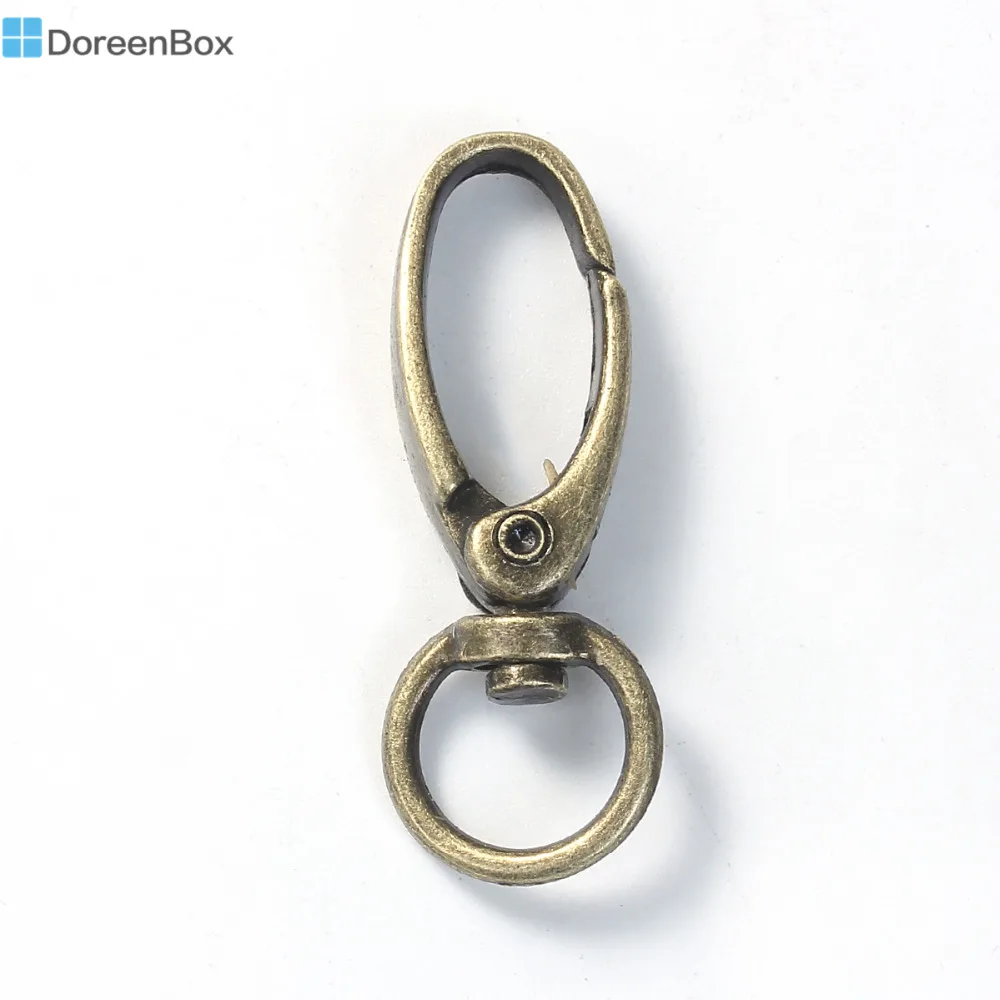 

Doreen Box Zinc Based Alloy Keychain & Keyring Oval Antique Bronze Key Chain 44mm(1 6/8") x 17mm( 5/8"), 5 PCs