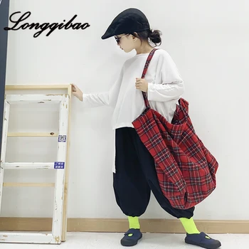 

Girls white cotton irregular loose T-shirt 2019 early autumn new shirt wild solid color comfortable long-sleeved shirt
