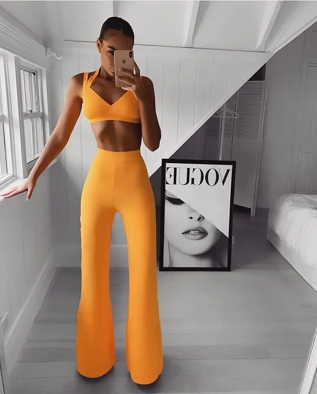 

2019 Europe and America spring and summer new bandage celebrity party red yellow sling V-neck speaker 2 piece set jumpsuit sexy
