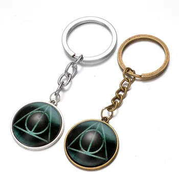 

Euro-American Movie Surrouding Harry Deathly Hallows Glass Cabochon Keychain Metal Alloy Key Chains Key Rings Wholesale