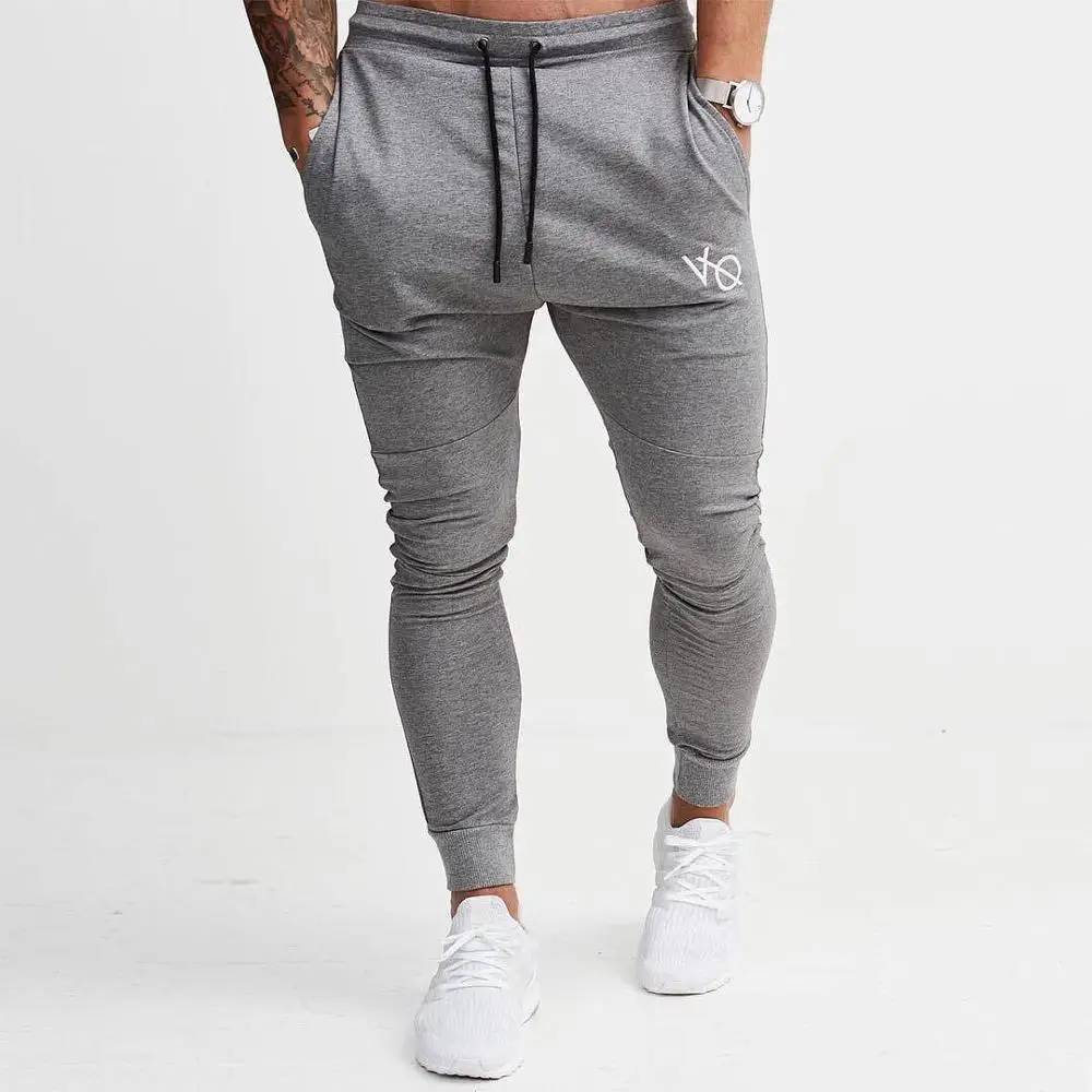 Для мужчин s джоггеры тренажерные залы новые мужские брюки Бодибилдинг для стройных мужчин спортивные мужские дышащие беговое трико обтягивающее пот брюки - Цвет: Gray