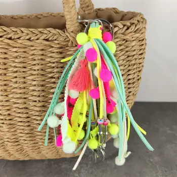 

Women Cute Pom Pom Keychain Bag Charms With Tassel Purse Charms Boho Keyring Colorful Leather Pendent Beach keychain