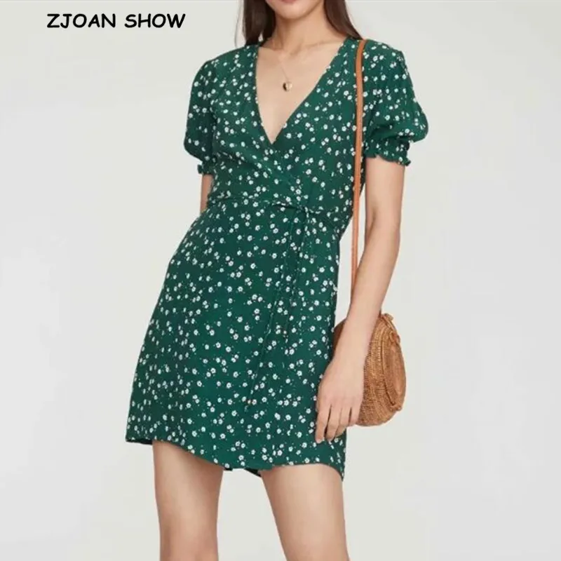 green wrap dress with white flowers