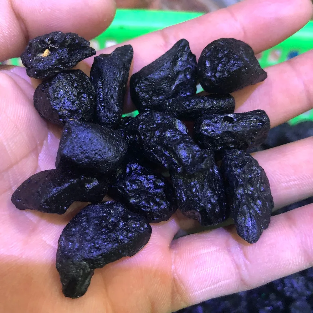 

100gA natural specimen of black indosinian magnetite tektite