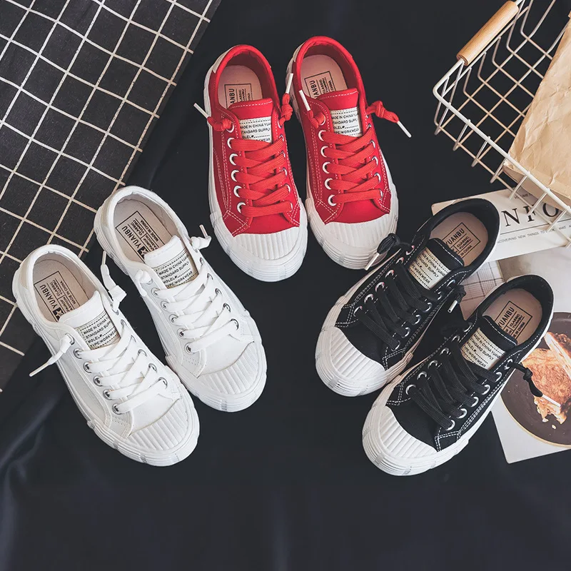 girls black canvas sneakers