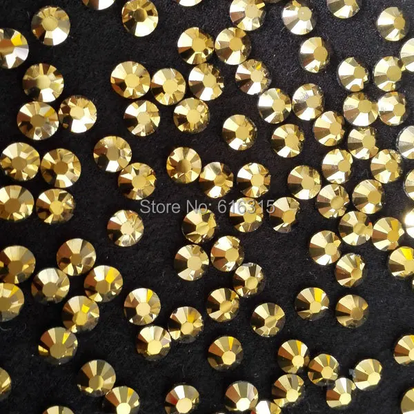 

superior shiny of hot-fix stones ss16 4mm size gold color in 1440 pcs each ;gold color stones for dancing shoes