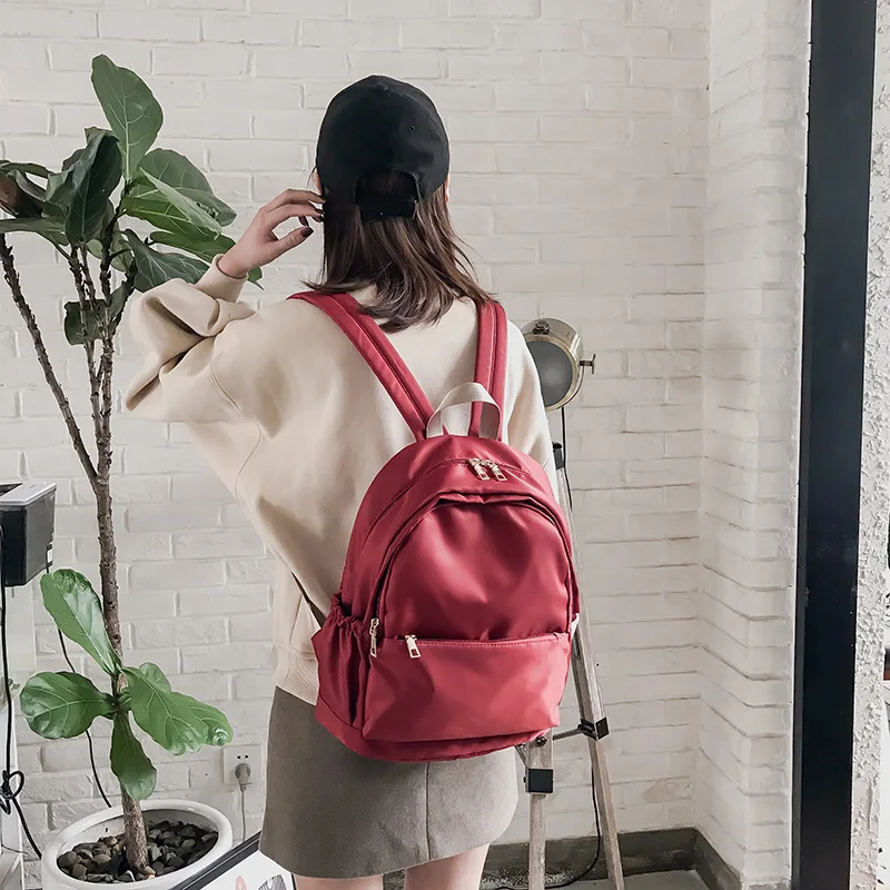 

Bag female Oxford cloth backpack female Korean fashion 2019 new solid color backpack casual wild campus waterproof bag