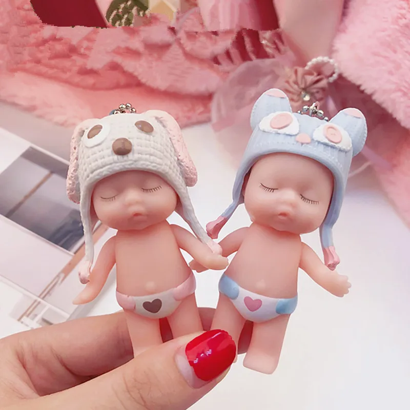 

Cute Cartoon Sleeping Baby Doll Keychain PVC Lovely Animal Hat Baby Car Keyring Women Key Holder BagCharm Jewelry Gift Child Toy