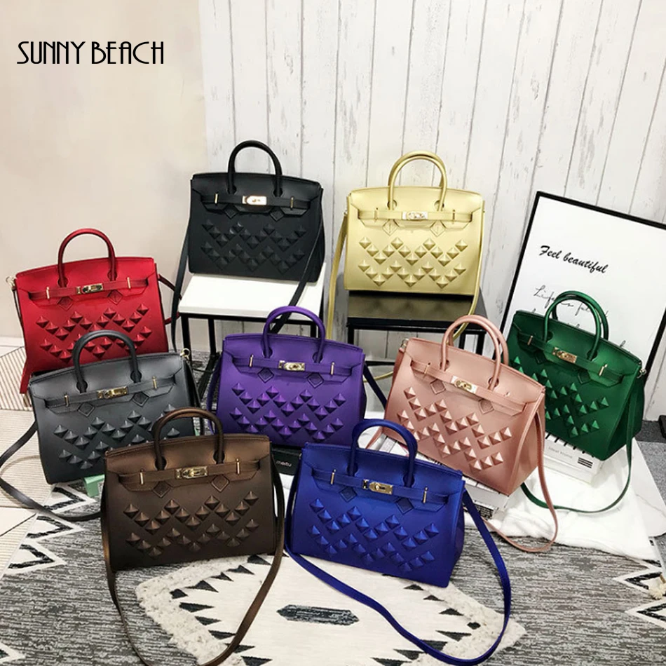 

Female Luxury 2019 new Rivet handbag Totes Bag Brand Designer Bag Women Shoulder Messenger PVC Matte jelly Bag Sanding women bag