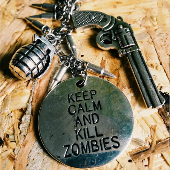 

Antique Metal Walking Dead Zombie Keychain Weapon Pendant Key Chain Ring
