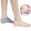 Hot Unisex Invisible Height Increase Socks Heel Pads Silicone Insoles Foot Massage ► Photo 1/6