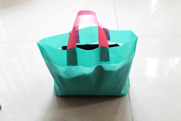 blue plastic bags with handles