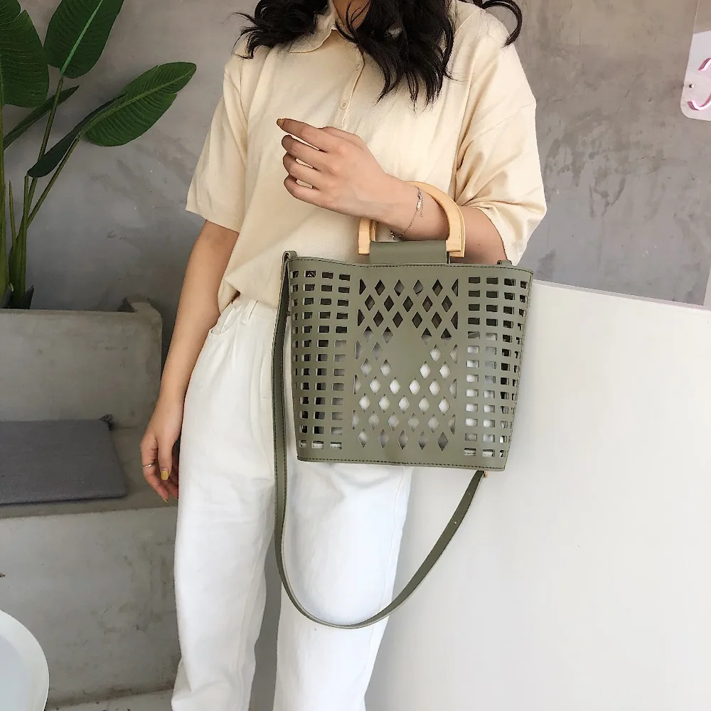 الجوف خارج حقيبة شاطئية للنساء 2019 الشهيرة العلامة التجارية سيدة الخشب مقبض حمل أكياس حقيبة كتف جلدية pu السفر المحافظ و حقائب الجوف خارج حقيبة شاطئية للنساء 2019 الشهيرة العلامة التجارية سيدة الخشب مقبض حمل أكياس حقيبة كتف جلدية pu السفر المحافظ و حقائب