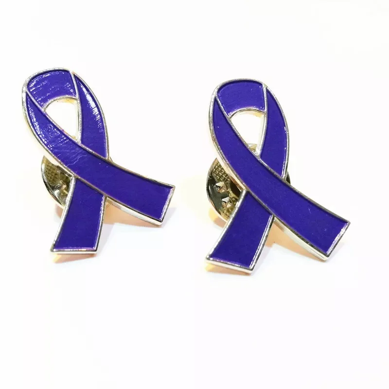

Purple ribbon lapel pin increases awareness of domestic violence