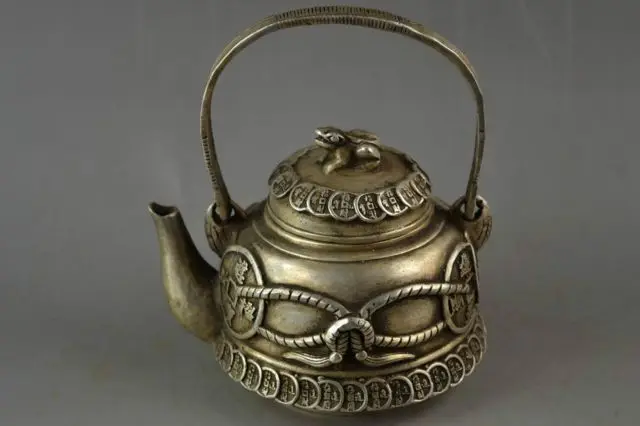 

China Old Handwork Miao Silver Carve C0in & Frog Lid Get Rich Good Lucky Teapot Garden Decoration 100% real Tibetan Silver Brass