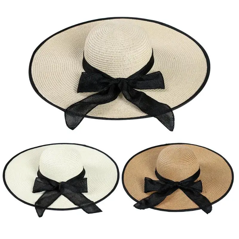Bowknot ديكور كبيرة حافة قبعة من القش للنساء الصيف شاطئ قبعة بواقٍ للشمس قبعة واقية من الشمس Bowknot ديكور كبيرة حافة قبعة من القش للنساء الصيف شاطئ قبعة بواقٍ للشمس قبعة واقية من الشمس