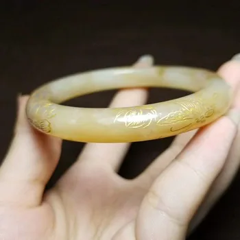 

H9#Russian material and Tianyu sugar white jade gold carved flower bracelet