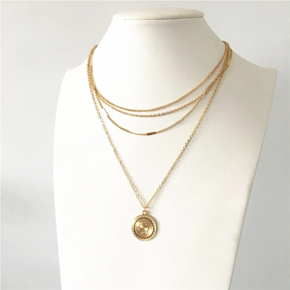 

Trendy gold color round engraved coin pendant with four different chain layered necklace