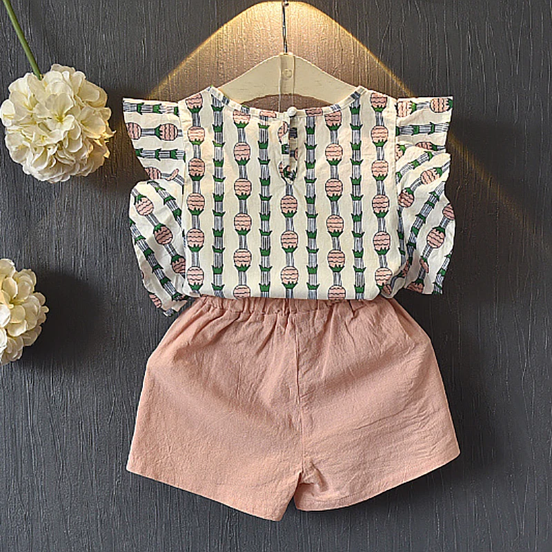 2 3 4 5 6 7 8 سنة الفتيات الملابس 2019 جديد الصيف عارضة ملابس الأطفال مجموعة الأناناس المطبوعة قمم السراويل 2 قطعة الاطفال الدعاوى