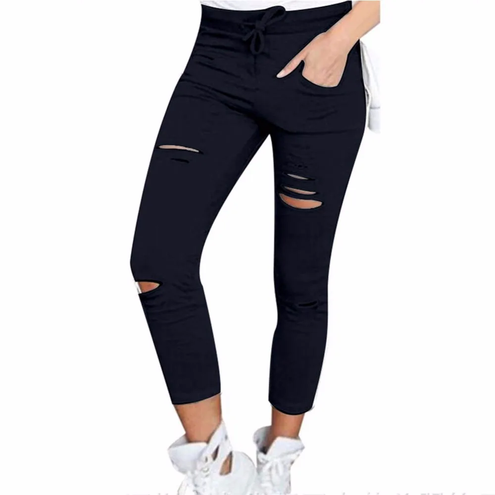 black torn pants