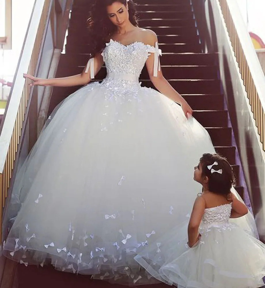 

Romantic cap sleeve off the shoulder wedding dress tulle ball gown wedding party dress luxury muslim bridal gowns with applique