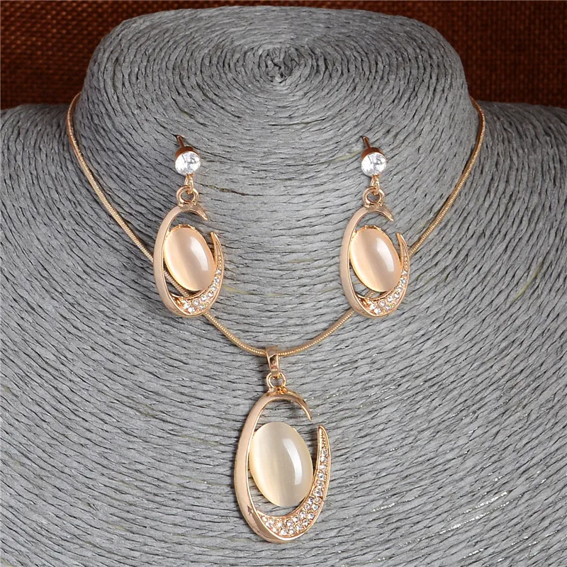 

Cheap Opal Oval Pendant Necklace Earrings Chain Crystal Stud Earrings Banquet Cat's Eye Stones Jewelry Sets for Girl