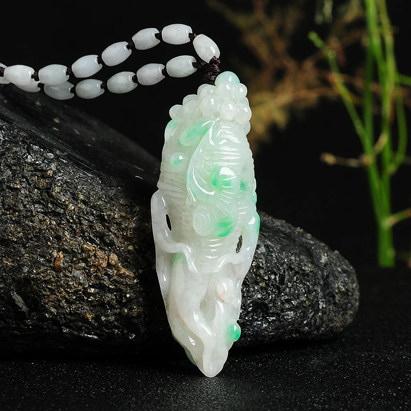 

Burmese light green bottom floating green jade hollow ginseng jade pendant Authentic A goods meaning life pendant