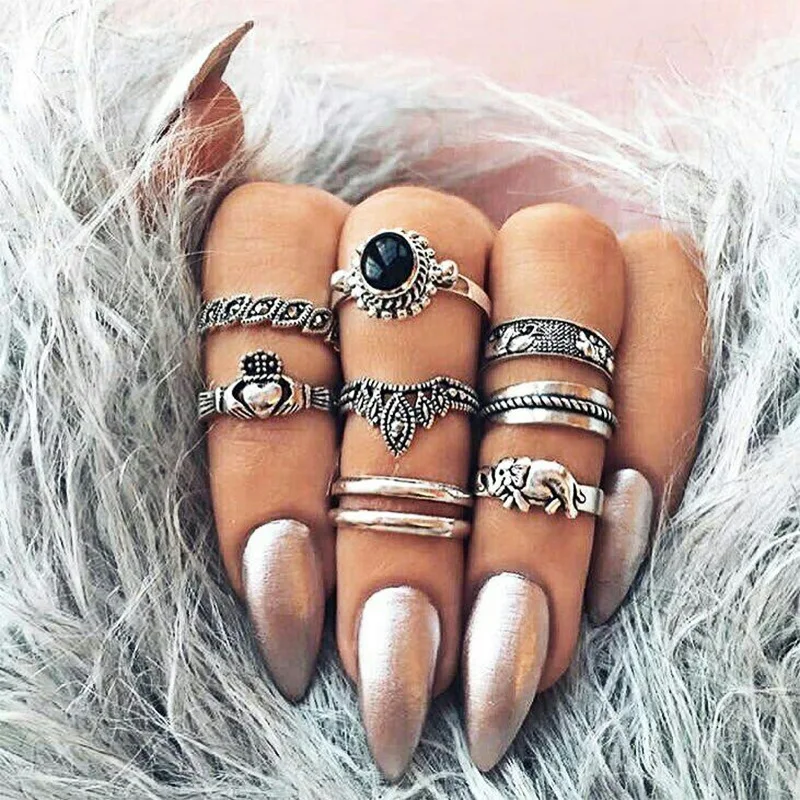 

New fashion retro Europe and America exaggerated retro ring eight sets of small carved crown love elephant exhibition 8 pieces /