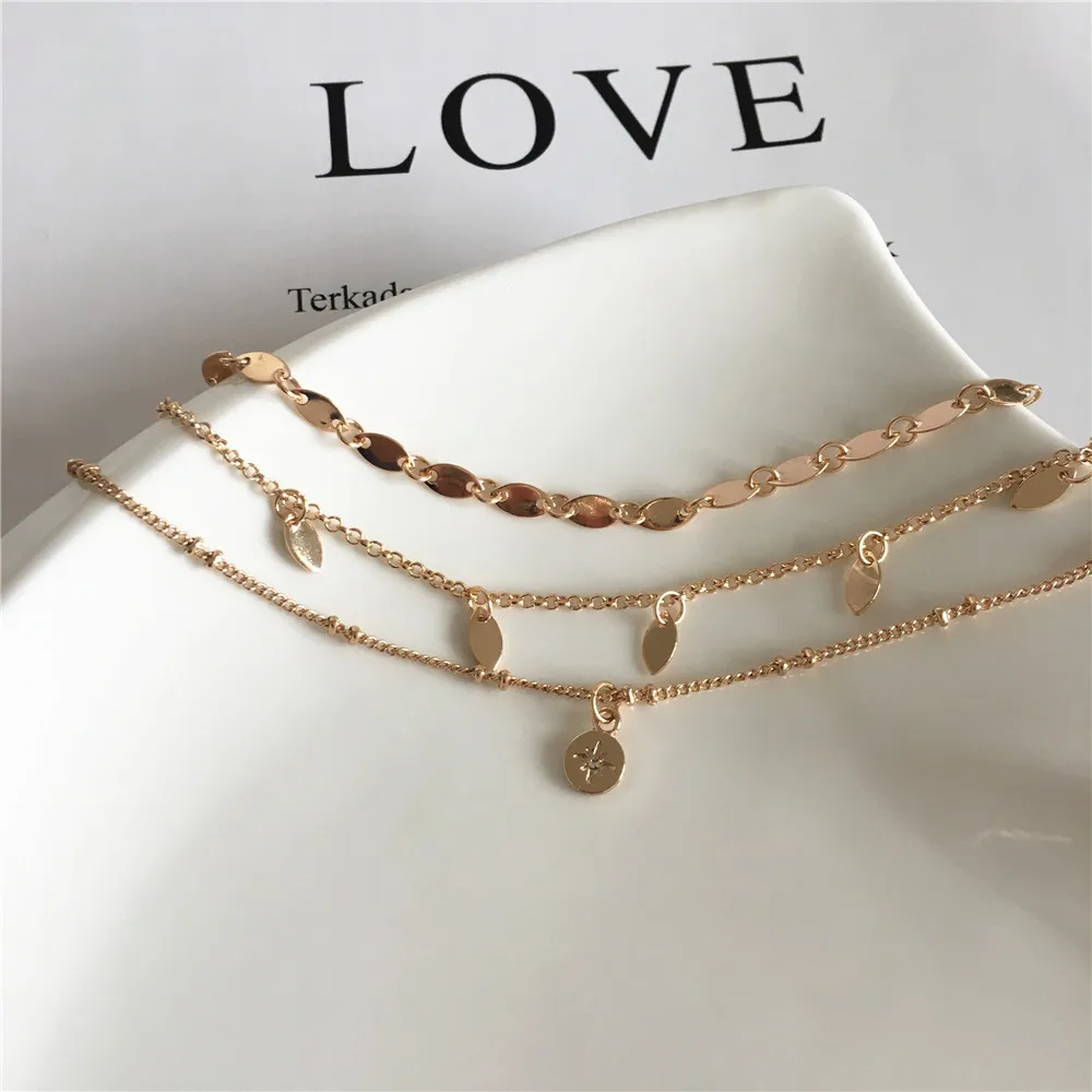 

LAYERED CHARM BRACELET/ANKLET