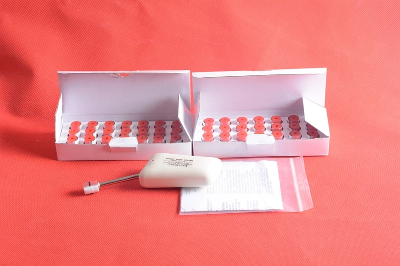 

UL 1439D Sharp Edge Tester with a box of the pressure testing cap