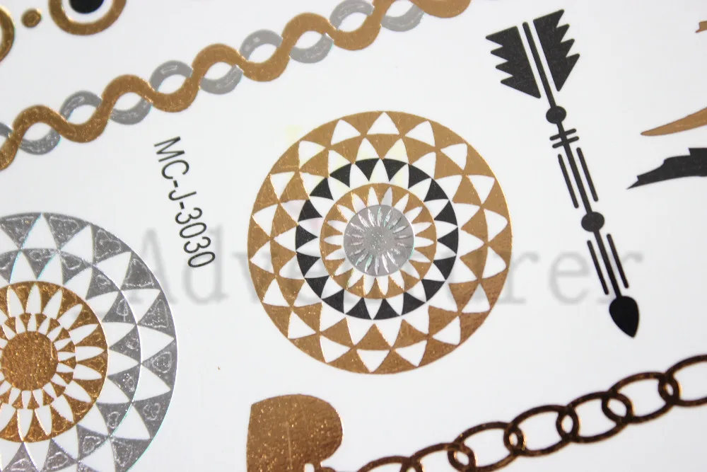 the new tribal tattoos gold metal tattoo design body art the new tribal tattoos gold metal tattoo design body art