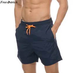 Для мужчин быстросохнущая шорты пляжные карман сплошной Цвет Лето сундук шорты Бесплатная страуса мужской спортивные брюки для бега плюс