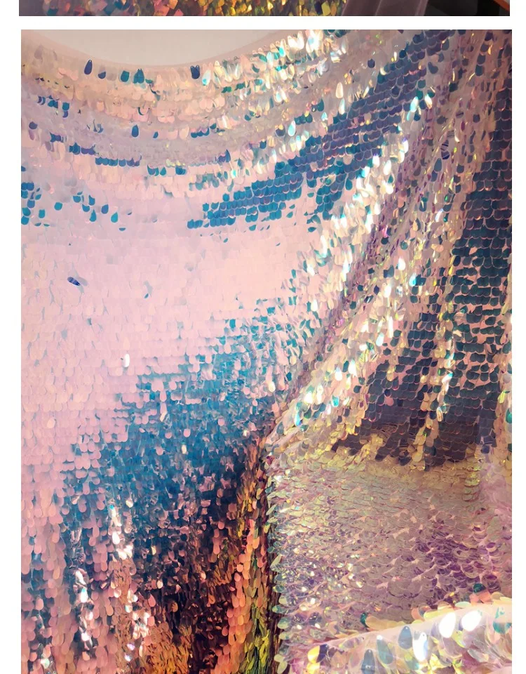 

1.3m wide, 1m long sequins fabric, 25mm tear drop sequins, Starlight Clear, Please note that we don't cut if order 1lot+