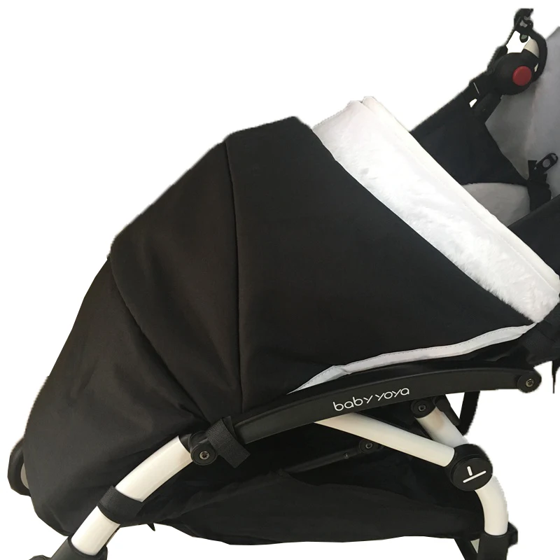 black stroller with footmuff