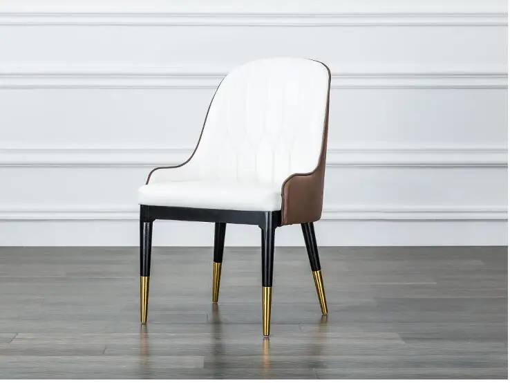 Light luxurious dining chair Italian designer fashionable stitching leather back neoclassical dining chair.. Light luxurious dining chair Italian designer fashionable stitching leather back neoclassical dining chair..