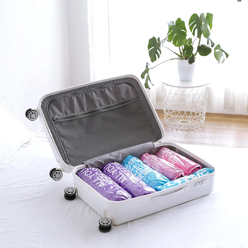 الملابس ضغط تخزين أكياس اليد المتداول الملابس PA + PE فراغ التعبئة أكياس السفر الفضاء التوقف أكياس للأمتعة المنظم