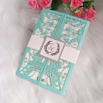 

50pcs Blue Laser Cut Wedding Invitation With Ivory Belt and Glitter Tag