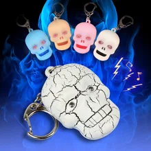Hot scary Halloween skeleton head LED sound light keychain LED luminous key chain flashlight pendant gift