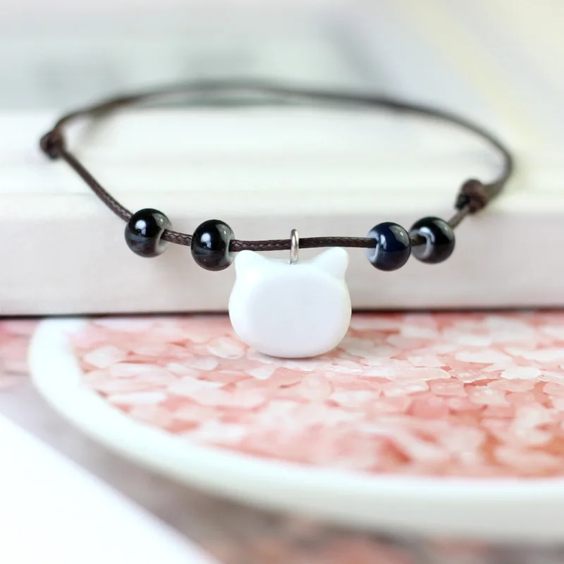

Cute Ceramic Cat Pendants Bracelets For Women Charm Beads Strand Bracelet Jewelry Ethnic Rope Knot Charms Bangle Accessories