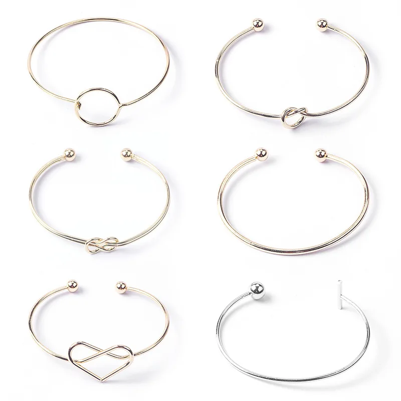 

Ladies Fashion Knotted Twisted Bracelets Simple Circle Love Heart Metal Open Bracelet Wholesale for Women Charm Jewelry MD002