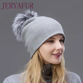 

2018 Hot The wool knitted hat spring autumn and winter warm earmuffs hat beautiful woman's cap with Fox fur Pompom on the hat