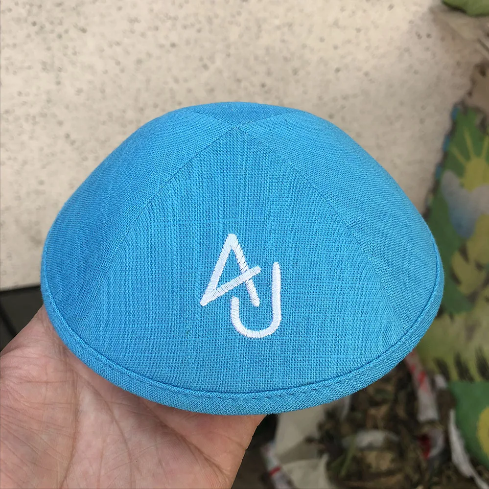 

bordeaux linen kippah with Rose Gold embroidery logo as client's design